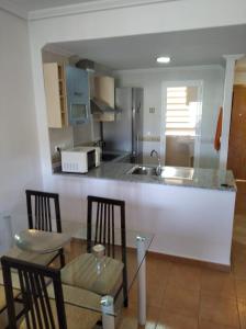 A kitchen or kitchenette at Precioso Apartamento Vistar mar/montaña