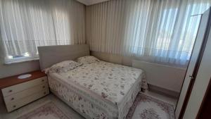 Ένα ή περισσότερα κρεβάτια σε δωμάτιο στο grand62