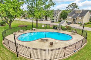an overhead view of a swimming pool in a yard at April Point Dr S in Montgomery