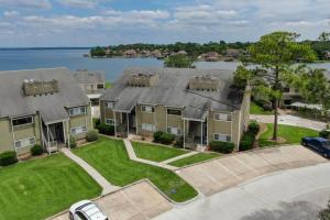 an aerial view of a large house with a yard at April Point Dr S in Montgomery