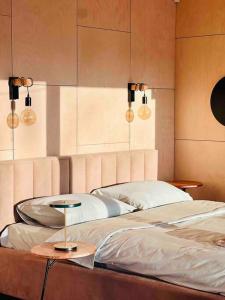 Posteľ alebo postele v izbe v ubytovaní House and sauna where city comforts meet nature