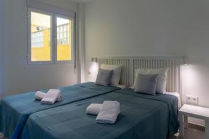 Katil atau katil-katil dalam bilik di Suite Añoreta Malaga Parking 101 +18 gambar
