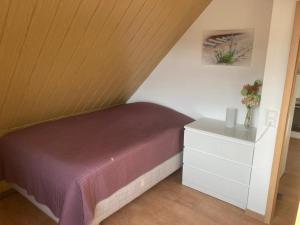 Postel nebo postele na pokoji v ubytování Gästezimmer zum Waldsachsener Grund