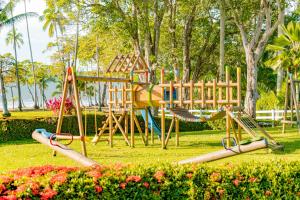 a park with a playground in the grass at Barceló Tambor - All Inclusive in Tambor