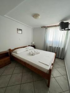 Posteľ alebo postele v izbe v ubytovaní Athina Rooms