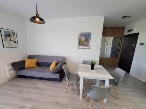 Zona d'estar a Apartament przy plaży