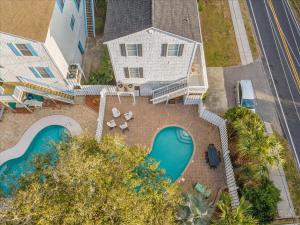 an aerial view of a house with a swimming pool at Mahalo House in Myrtle Beach