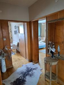 Postel nebo postele na pokoji v ubytování Infinity Boutique Apartments