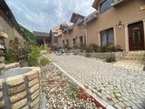 a bike parked in front of a house at Villa 1880 in Sremski Karlovci