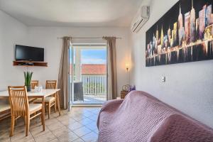 TV a/nebo společenská místnost v ubytování Apartments Irena