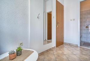 Koupelna v ubytování Apartments Irena + 37 fotografií