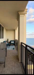 a balcony with a view of the ocean at Singer Island Beach resort and Spa, Located at the Palm Beach Marriott in Riviera Beach
