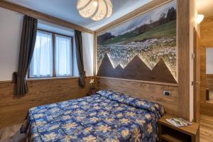 Postel nebo postele na pokoji v ubytování Hotel Al Sole