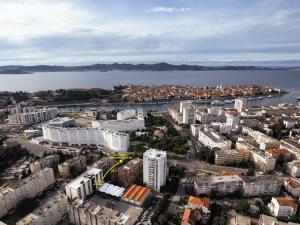 an aerial view of a city and a body of water at Hotel A'mare in Zadar