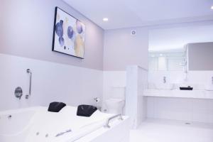 Vannituba majutusasutuses Bisinii Boutique Hotel