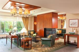 a living room filled with furniture and a fireplace at Residence Inn by Marriott Boston Harbor on Tudor Wharf in Boston