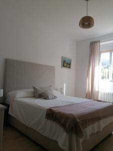 Posteľ alebo postele v izbe v ubytovaní Casa O Vicedo