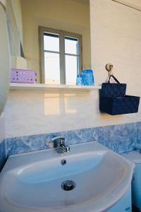Koupelna v ubytování Hotel Le Giare