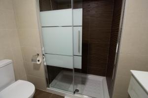 Kúpeľňa v ubytovaní RentitSpain Apartamento Oasis de Salobreña Gym y Balcón
