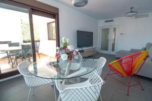 Posedenie v ubytovaní RentitSpain Apartamento Oasis de Salobreña Gym y Balcón