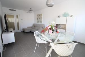 Posedenie v ubytovaní RentitSpain Apartamento Oasis de Salobreña Gym y Balcón