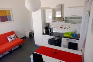 Kuchyň nebo kuchyňský kout v ubytování Apartments 1234