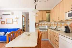 Kuchyň nebo kuchyňský kout v ubytování Stay U-nique Apartment Carlota Alessandri