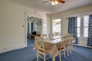 a dining room with a table and chairs at Majestic Hotel & Apartments in Ocean City