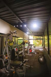 a gym with several exercise bikes in a room at Reserva Campos do Jordão in Campos do Jordão