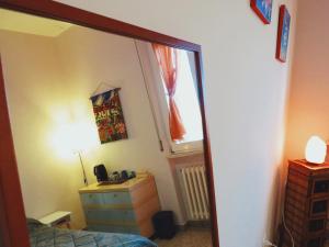 Postel nebo postele na pokoji v ubytování B&B CasaGiò
