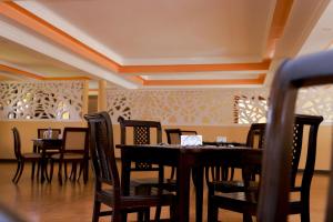 A restaurant or other place to eat at Rossina Living