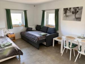 Ένα ή περισσότερα κρεβάτια σε δωμάτιο στο Apartment Tour Bohemian Switzerland