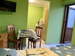 Telewizja i/lub zestaw kina domowego w obiekcie Międzyzdrojanka