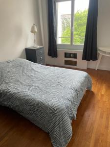 Postel nebo postele na pokoji v ubytování APPT CENTRE VILLE ROUEN