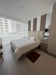 Postel nebo postele na pokoji v ubytování Coffee Studio - Best Location Quito