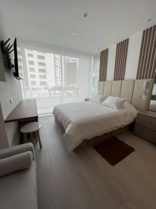 Postel nebo postele na pokoji v ubytování Coffee Studio - Best Location Quito