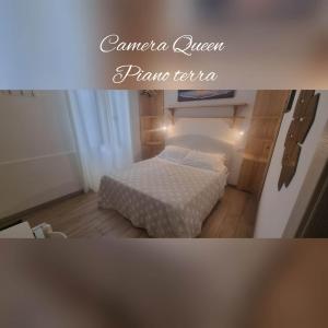 a small bedroom with a bed in a room at B&B D'AMARE in Cupra Marittima