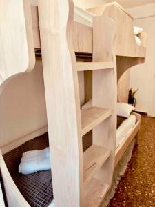 A bed or beds in a room at Citadella Apartment