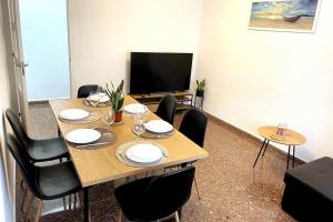 A television and/or entertainment centre at Citadella Apartment