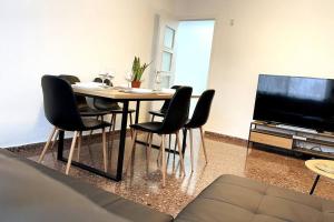 A television and/or entertainment centre at Citadella Apartment