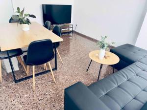 A television and/or entertainment centre at Citadella Apartment