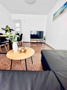 A television and/or entertainment centre at Citadella Apartment