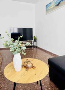 A television and/or entertainment centre at Citadella Apartment