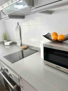 A kitchen or kitchenette at Citadella Apartment