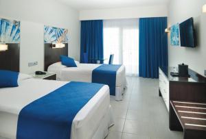 Lova arba lovos apgyvendinimo įstaigoje Riu Reggae - Adults Only - All Inclusive