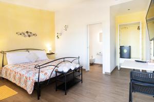 Posteľ alebo postele v izbe v ubytovaní Agriturismo Sa Jana Holidays - Adults Only