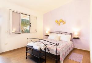 Posteľ alebo postele v izbe v ubytovaní Agriturismo Sa Jana Holidays - Adults Only