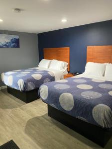 Voodi või voodid majutusasutuse Dunmore Inn toas