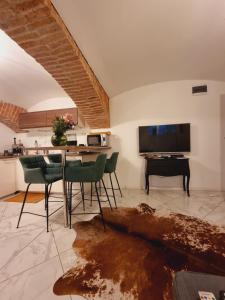 TV a/nebo společenská místnost v ubytování Apartment La Bodega