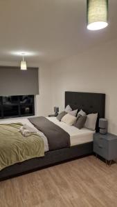 Postel nebo postele na pokoji v ubytování Luxury Apartment Birmingham